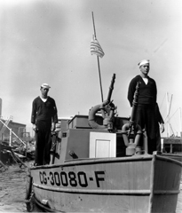 Coast Guard Reservist on a Coast Guard boat.