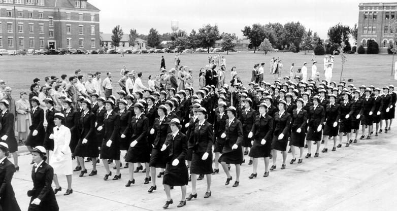 Coast Guard SPAR women reserve recruits march together as part of their training